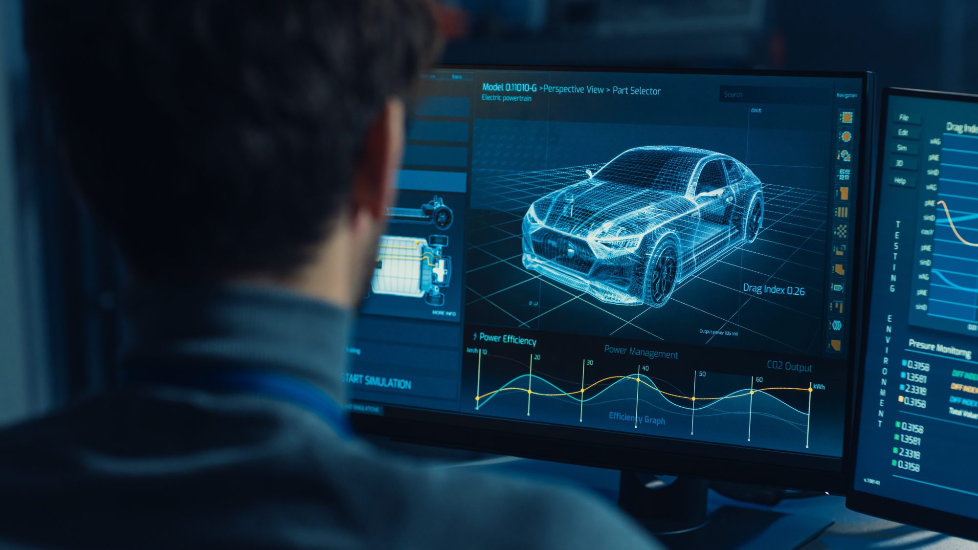 Professional Automotive Graphic Designer is Working on 3D CAD Software Rendering Electric Concept Car and Calculating its Efficiency in a High Tech Innovative Laboratory with a Prototype. Professional Automotive Graphic Designer is Working on 3D CAD Software Rendering Electric Concept Car and Calculating its Efficiency in a High Tech Innovative Laboratory with a Prototype.