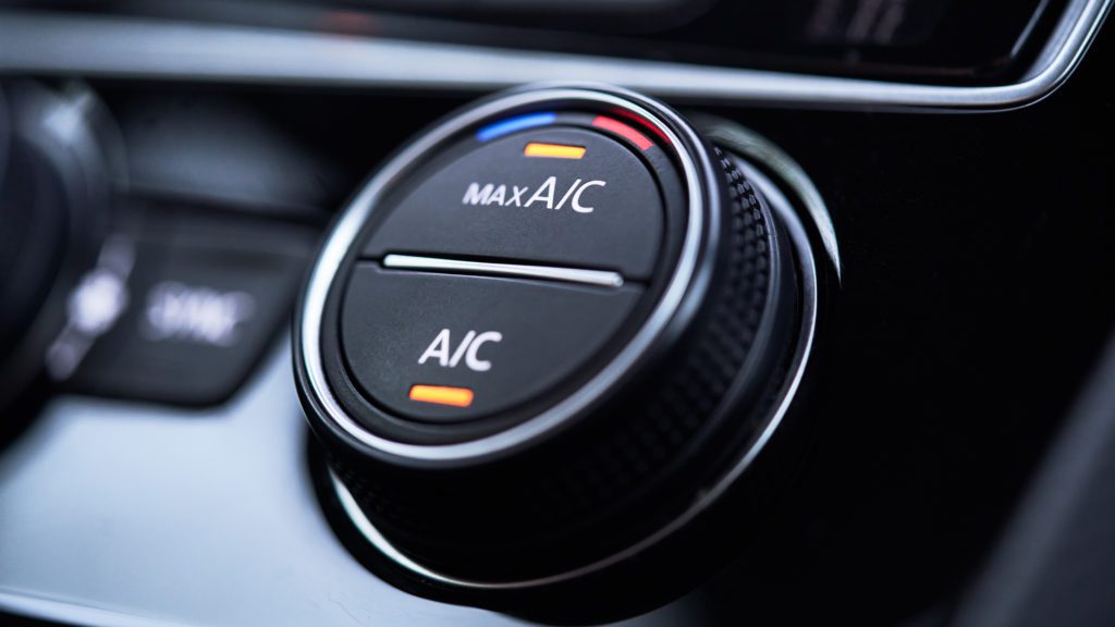 air conditioning control knob in a car on the dashboard