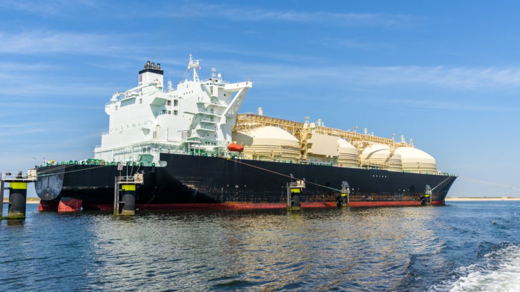 LNG tanker ship docked at a port