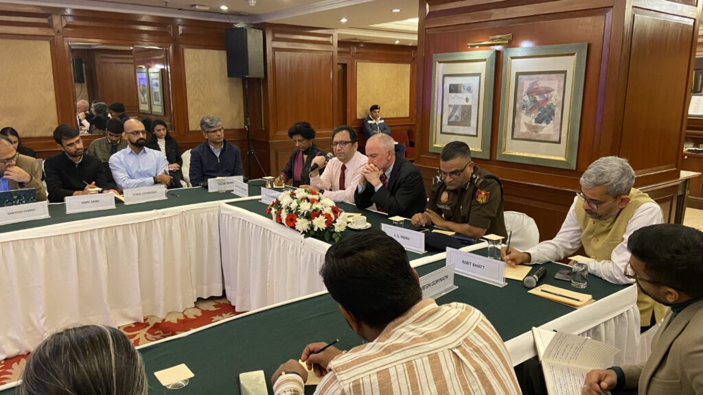 ICCT directors and guests seated around a table at the February 13, 2023 event in New Delhi.